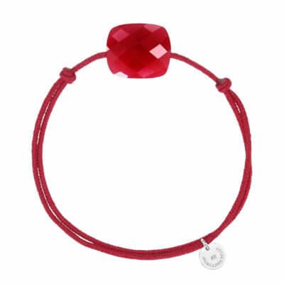 Friandise oversize red cord bracelet and red quartz cushion