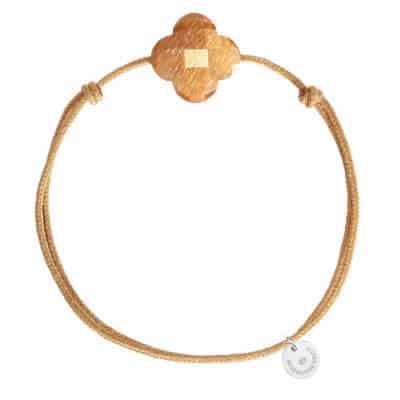 Beige clover bracelet beige cord with a sun stone