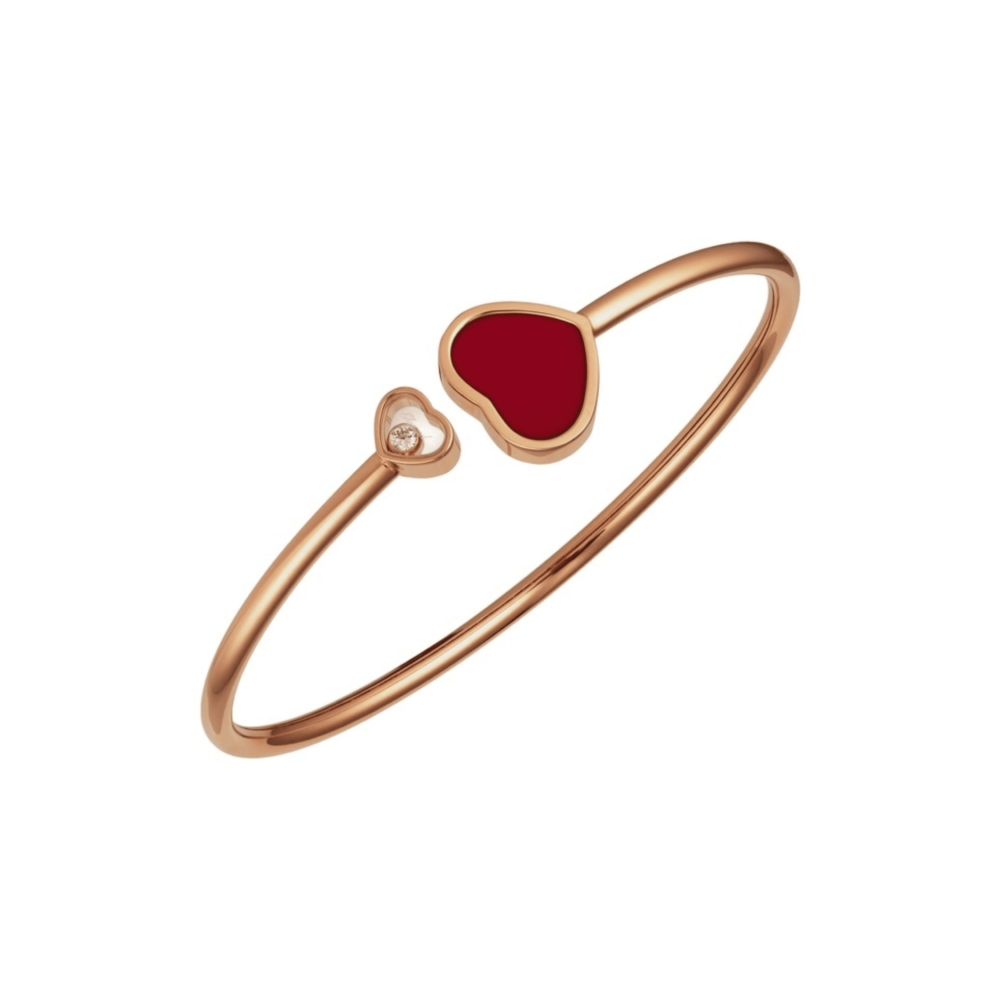 Happy Hearts bracelet rigide en or rose, coeur avec une pierre rouge et un coeur avec un diamant mobile