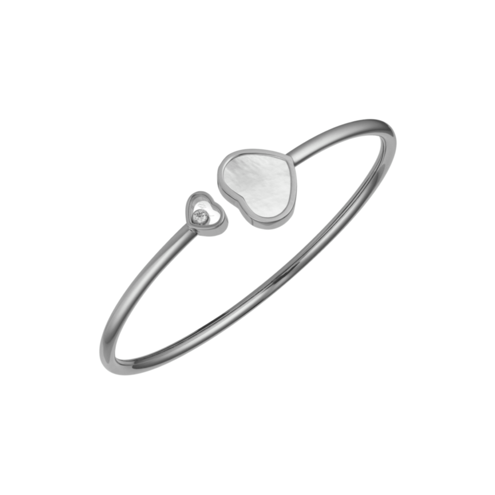 Happy Hearts, bracelet en or blanc avec un coeur nacre et un coeur avec un diamant mobile