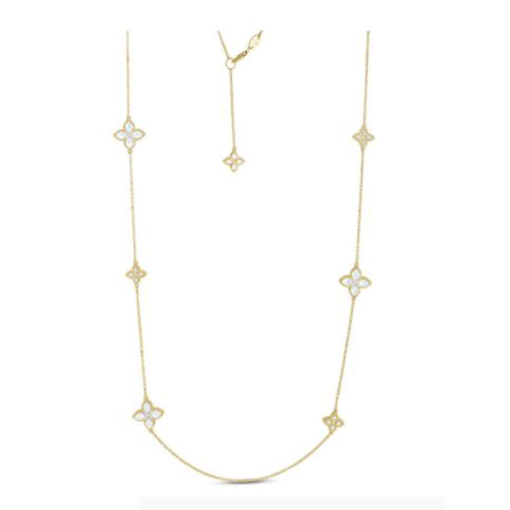 Fleur de princesse sautoir en or rose 750 avec des motifs fleurs sertis de 65 diamants et des motifs fleurs sertis de 48 nacres et un rubis