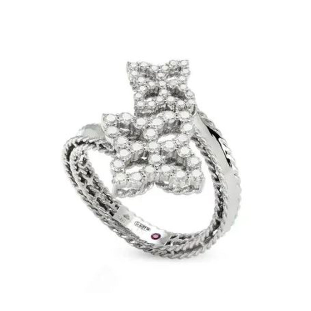 Fleur de princesse bague en or blanc avec deux motifs fleurs sertis de 50 diamants et un rubis