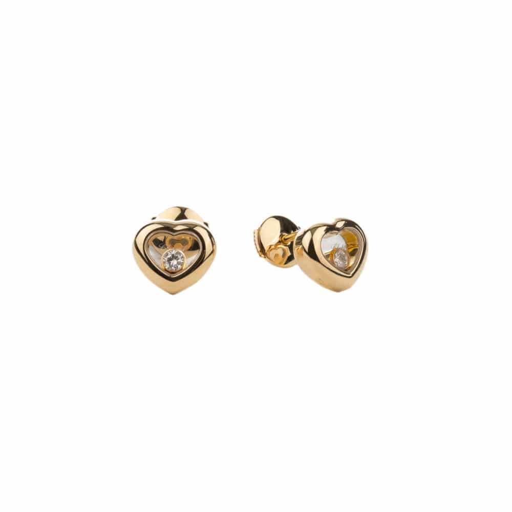 Happy Diamonds, une paire de boucles d’oreilles en or jaune, motif cœurs avec 2 diamants mobiles