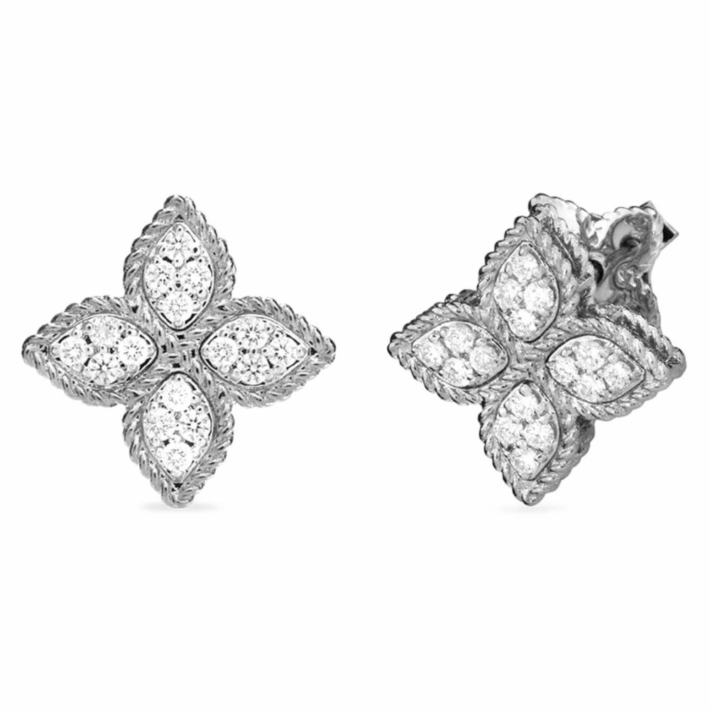 Fleur de Princesse boucles d’oreilles en or blanc serties de 32 diamants et deux rubis