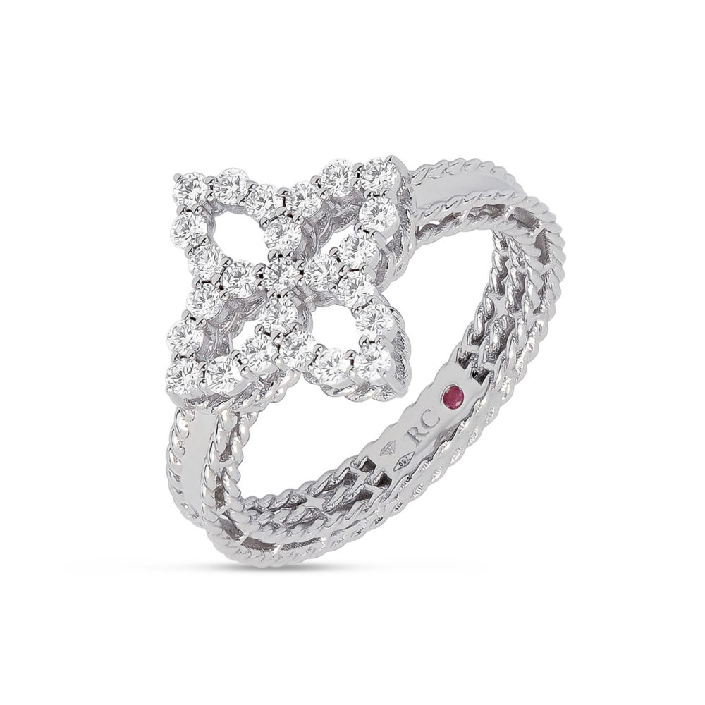 Princesse diamant bague en or blanc motif fleur sertie de 25 diamants et un rubis