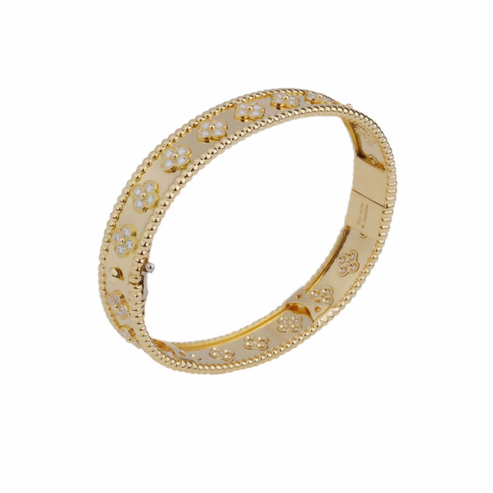 “Perlée” rigid bracelet in yellow gold