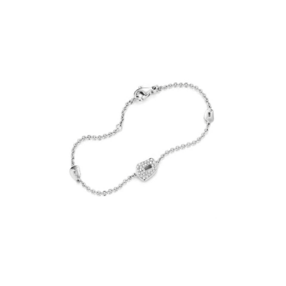 Puzzle bracelet in white gold set with white diamonds