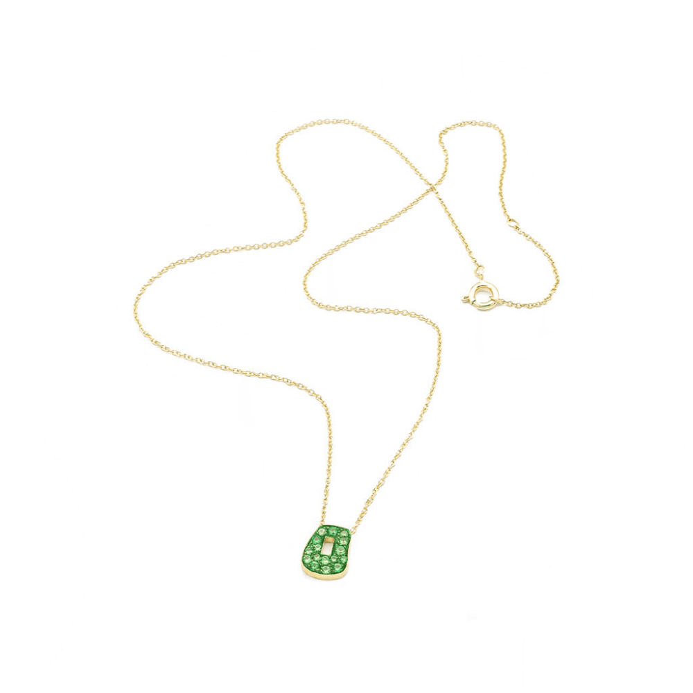 Mini puzzle necklace in yellow gold set with tsavorites