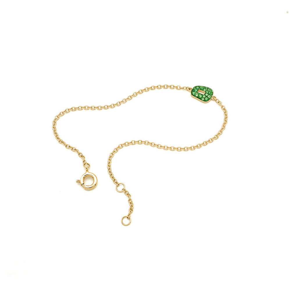 Mini puzzle bracelet in yellow gold set with tsavorite