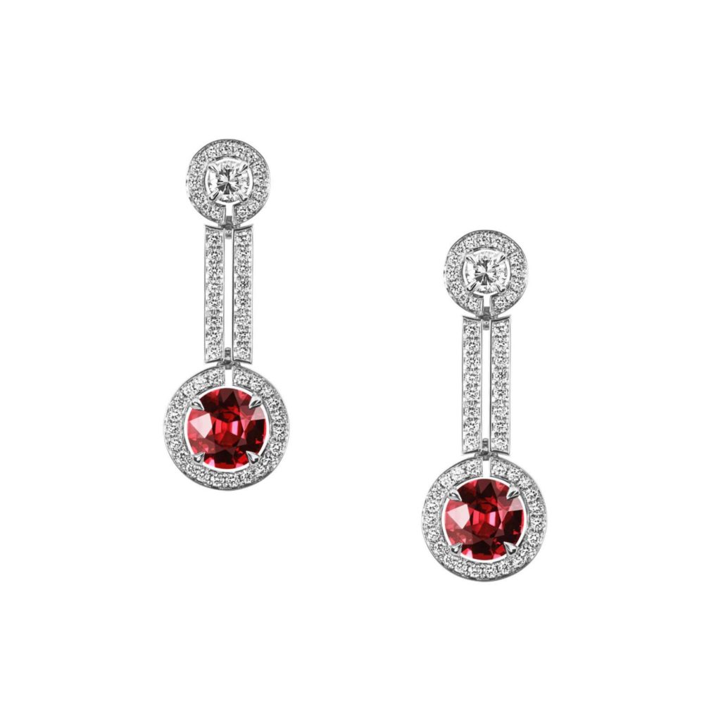 White gold earrings set with two 1.13ct oval-cut spinels surrounded by white diamonds
