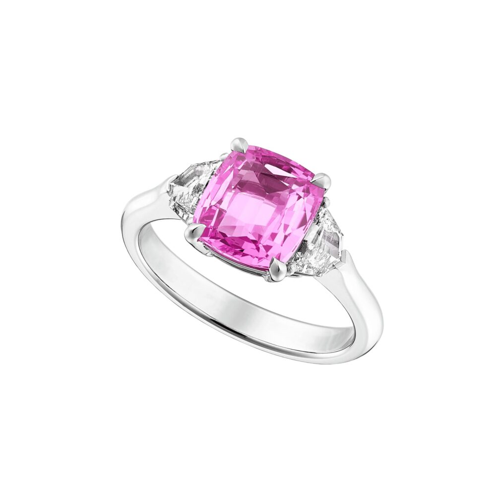Hard platinum ring set with a pink sapphire and diamonds