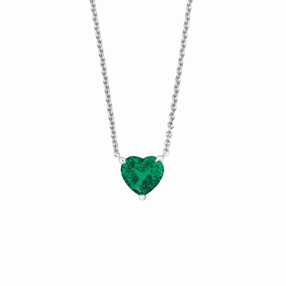 White gold necklace set with an emerald heart